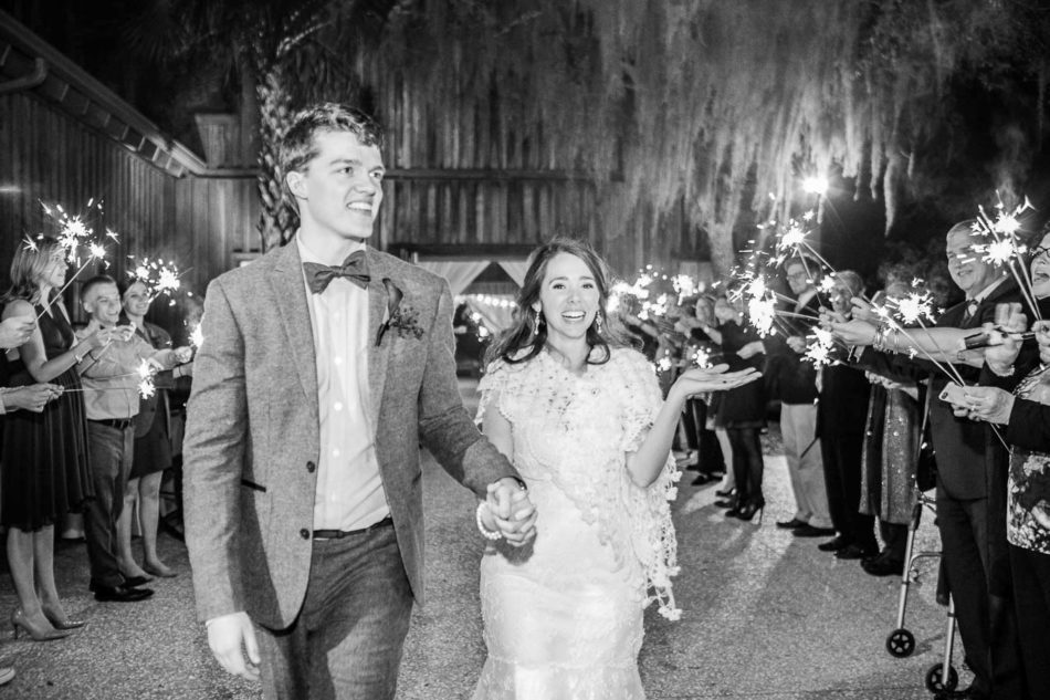 Bride and groom have sparkler exit, Boone Hall Plantation, Charleston, South Carolina. Kate Timbers Photography. http://katetimbers.com #katetimbersphotography // Charleston Photography // Inspiration