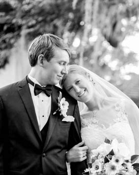 Bride and groom stand under avenue of oaks, Oakland Plantation, Mt Pleasant, South Carolina Kate Timbers Photography. http://katetimbers.com #katetimbersphotography // Charleston Photography // Inspiration