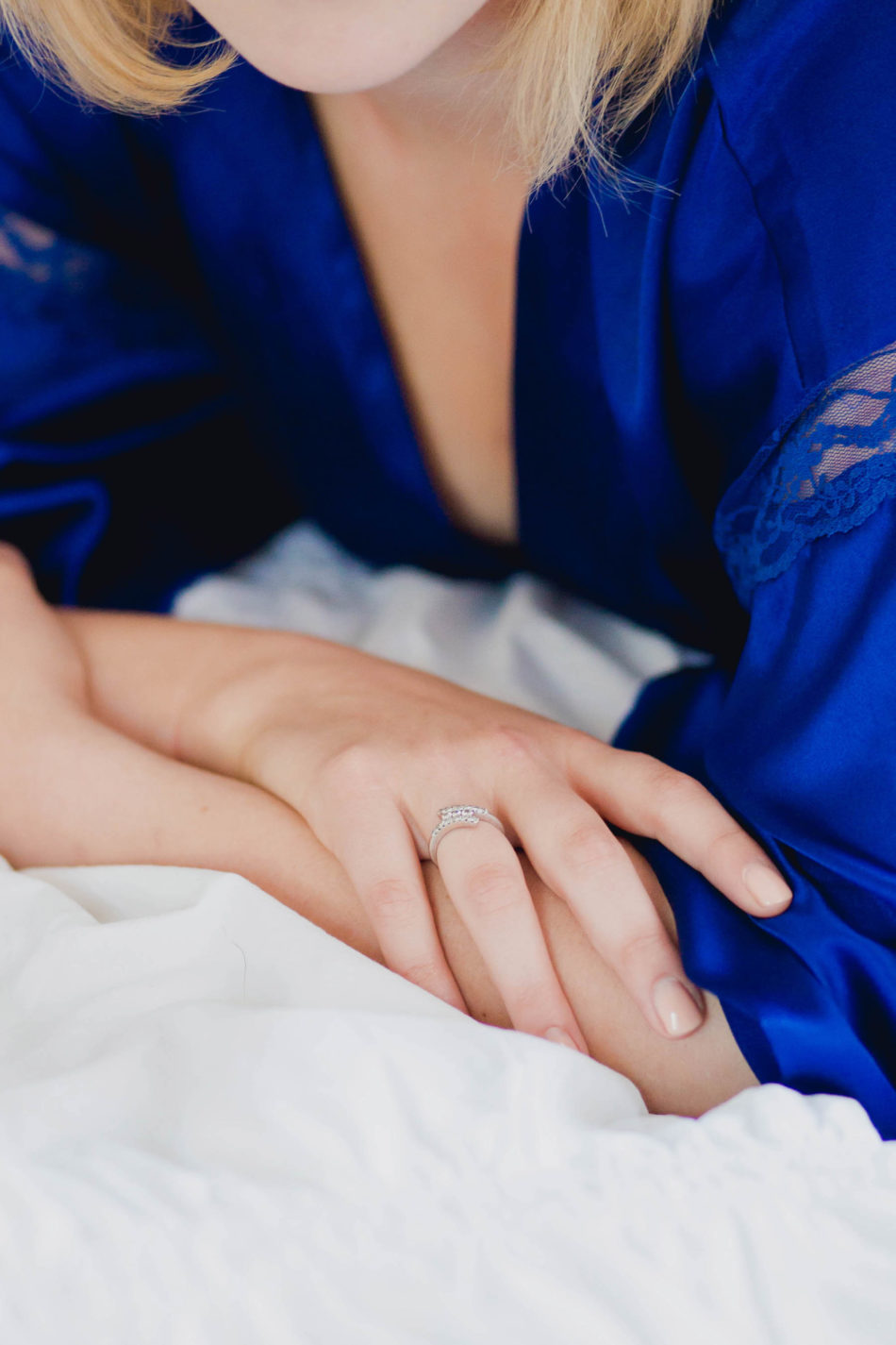 Ms M wears a silky navy blue robe in bed, Boudoir Photography, Charleston, SC Kate Timbers Photography. http://katetimbers.com #katetimbersphotography // Charleston Photography // Inspiration