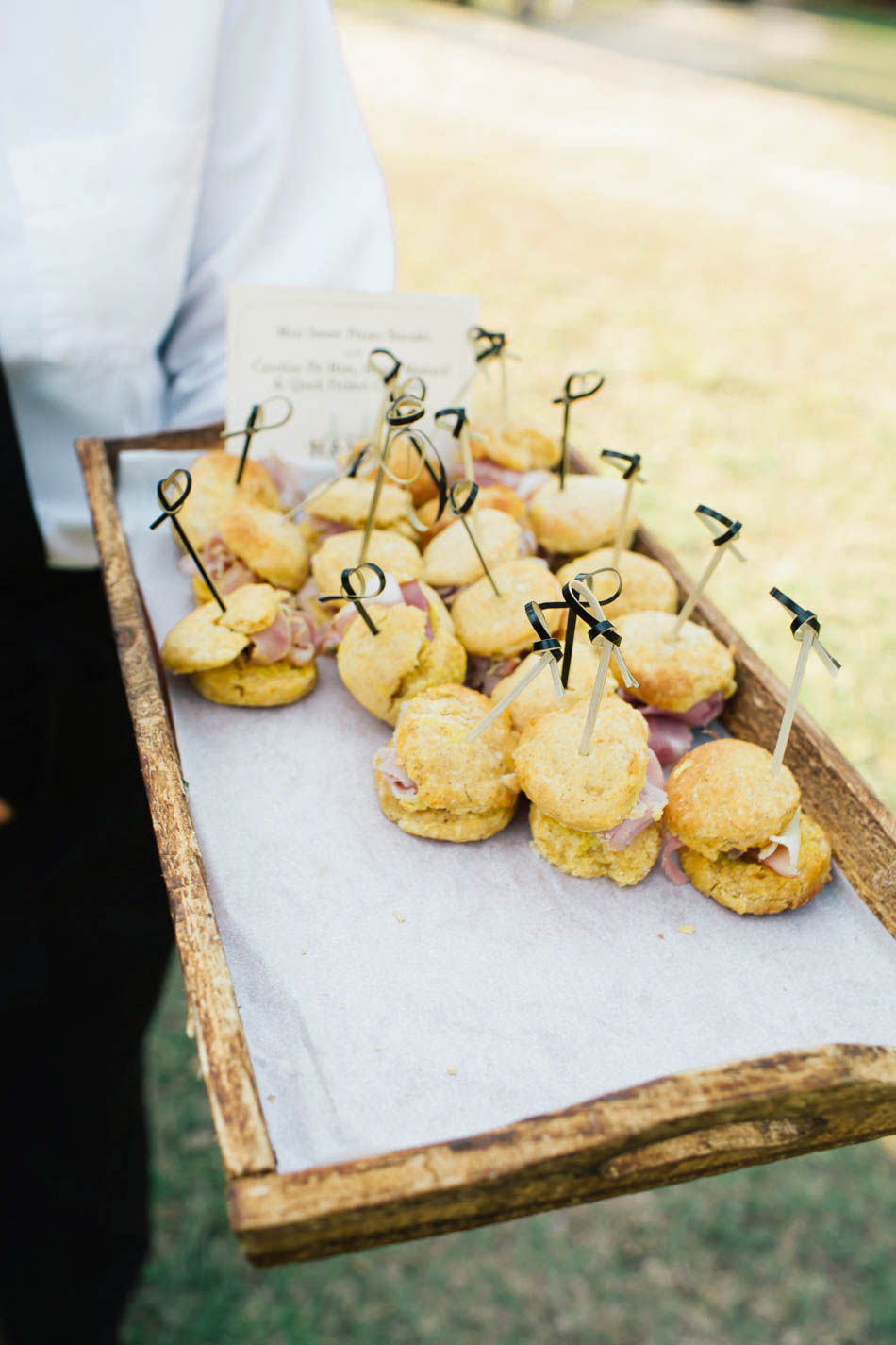 Waiter holds out small appetizer tray, Oakland Plantation, Mt Pleasant, South Carolina Kate Timbers Photography. http://katetimbers.com #katetimbersphotography // Charleston Photography // Inspiration