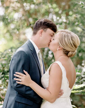 Bride and groom stand among palm trees, Wild Dunes, Charleston, South Carolina Kate Timbers Photography. http://katetimbers.com #katetimbersphotography // Charleston Photography // Coleman Hall