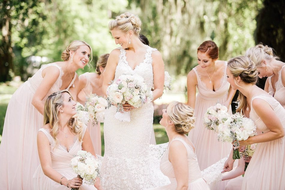 Bride poses with bridesmaids, Magnolia Plantation, Charleston, South Carolina Kate Timbers Photography. http://katetimbers.com #katetimbersphotography // Charleston Photography // Inspiration
