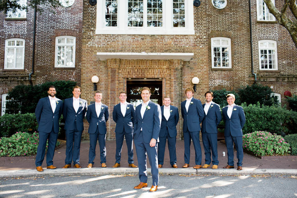 Groomsmen line up in front of the Rice Mill Building, Charleston, South Carolina Kate Timbers Photography. http://katetimbers.com #katetimbersphotography // Charleston Photography // Inspiration